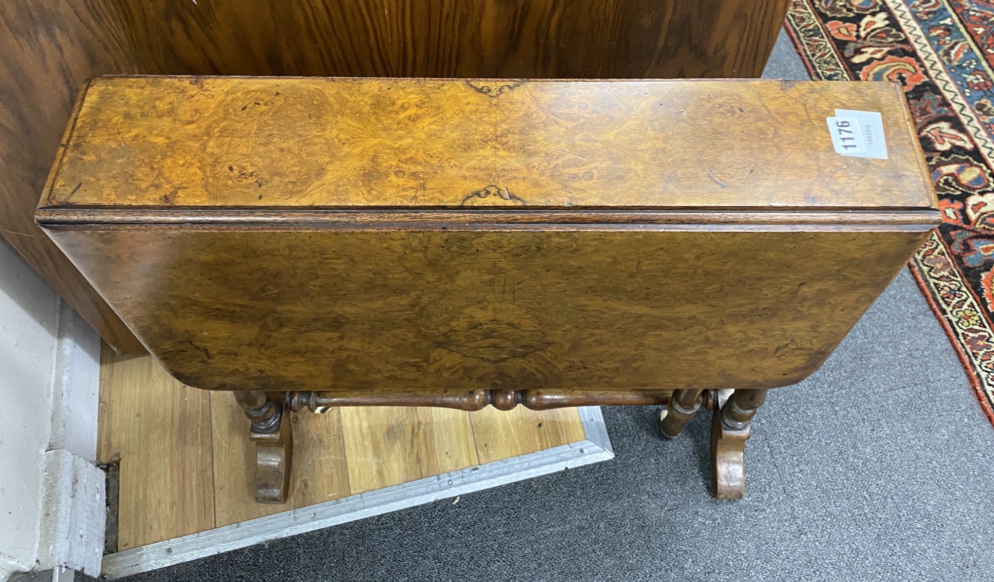 A Victorian burr walnut Sutherland table, width 60cm, height 59cm